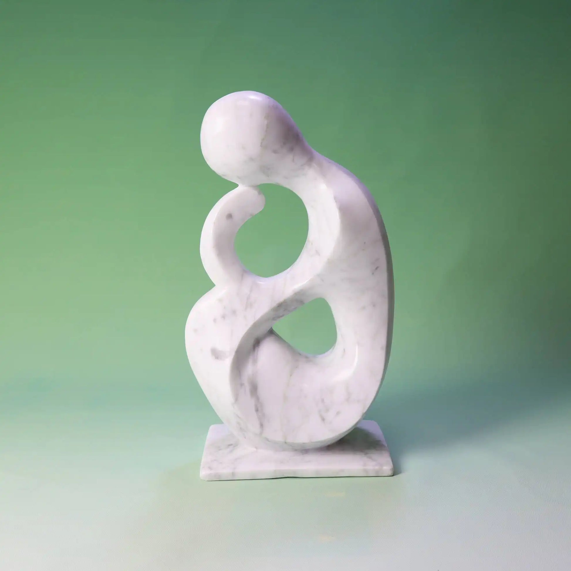 Abstract marble sculpture with smooth, flowing design