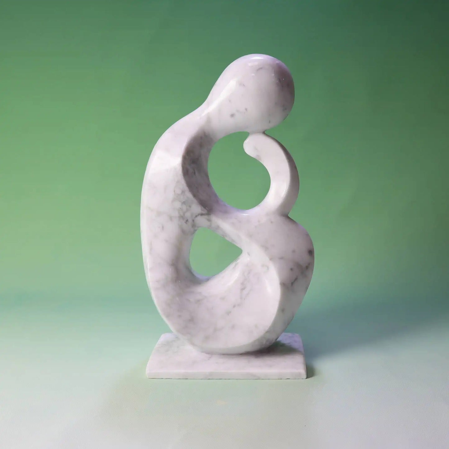 Abstract marble sculpture with smooth, flowing design