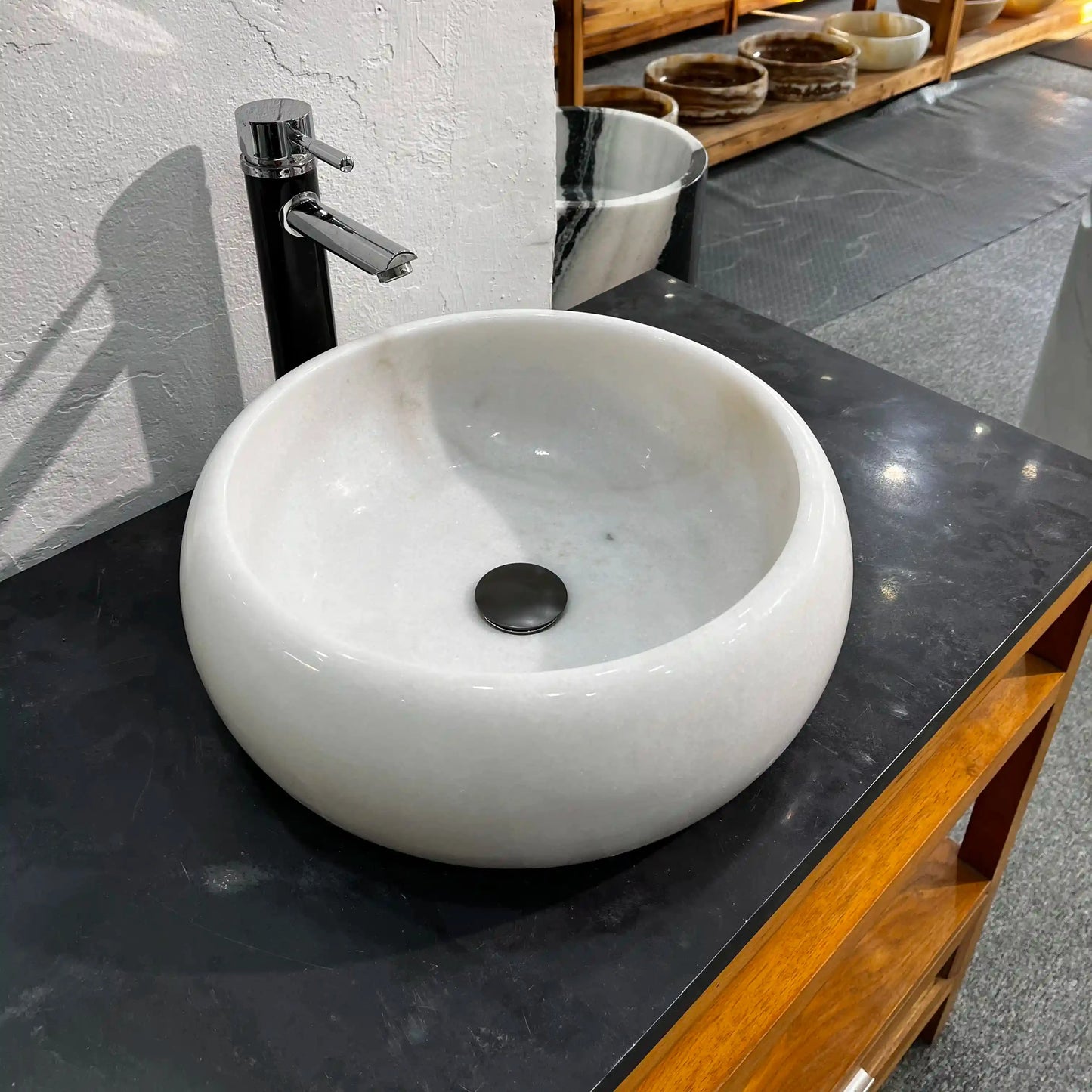 Chess piece-inspired marble sink with custom options available.