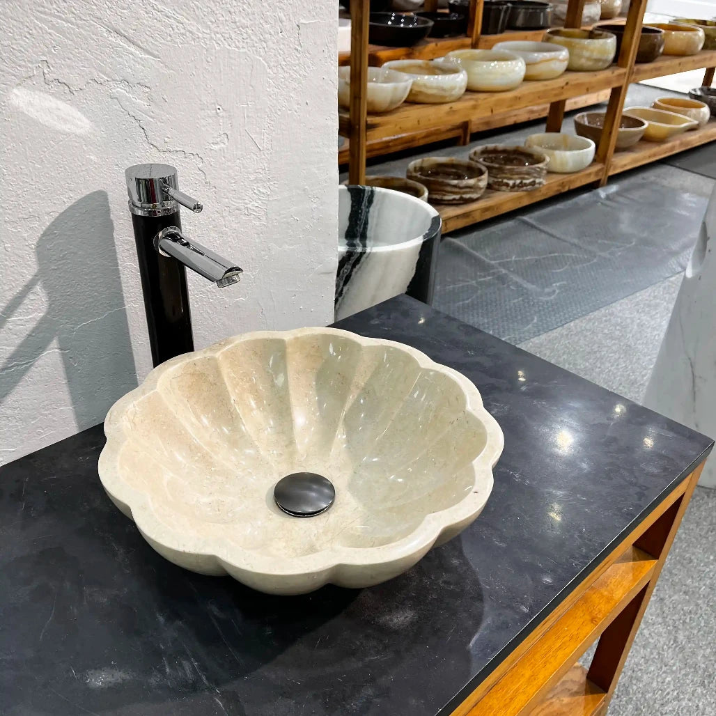 Fluted polygonal marble sink with custom options available.