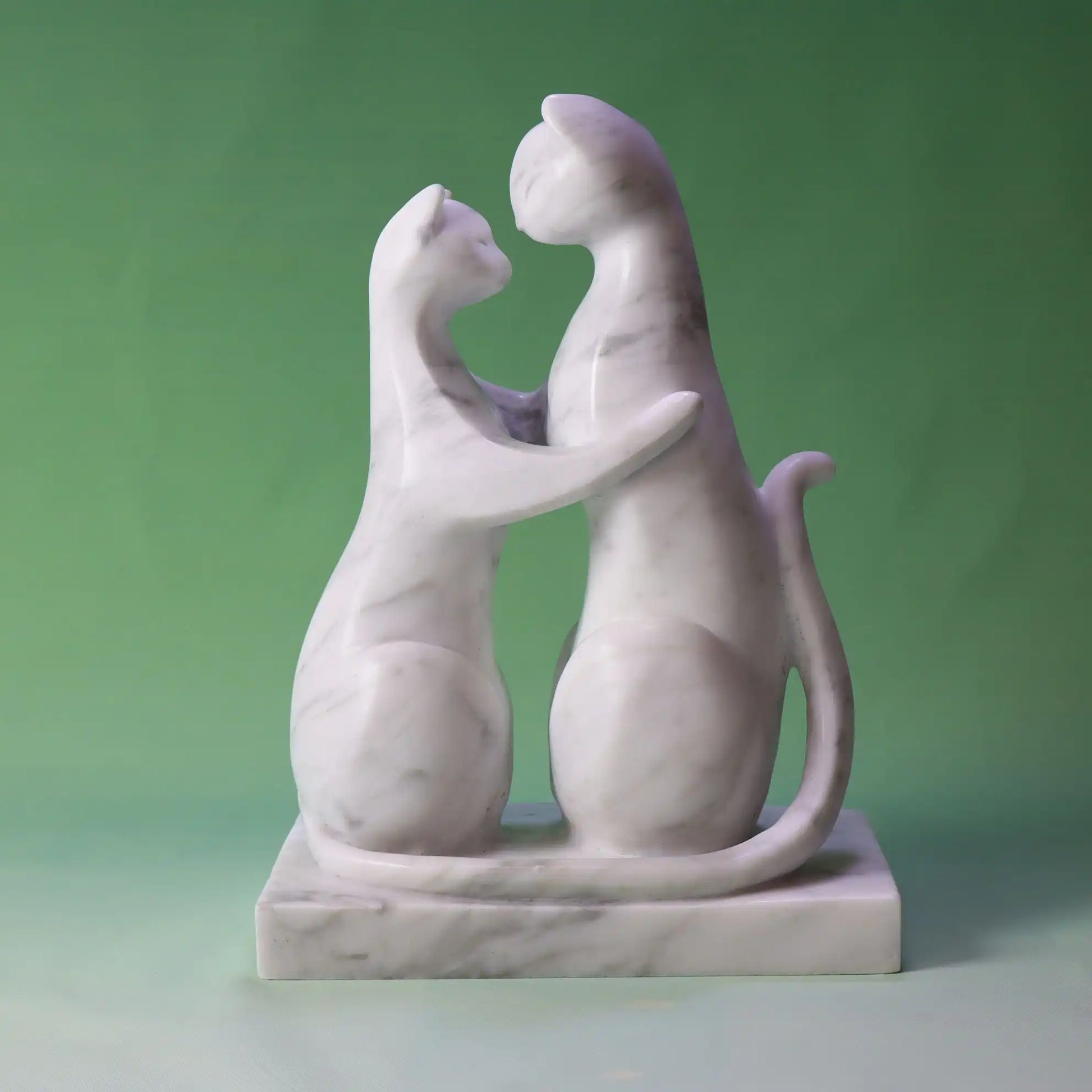 Elegant marble cat couple sculpture with a sleek modern design