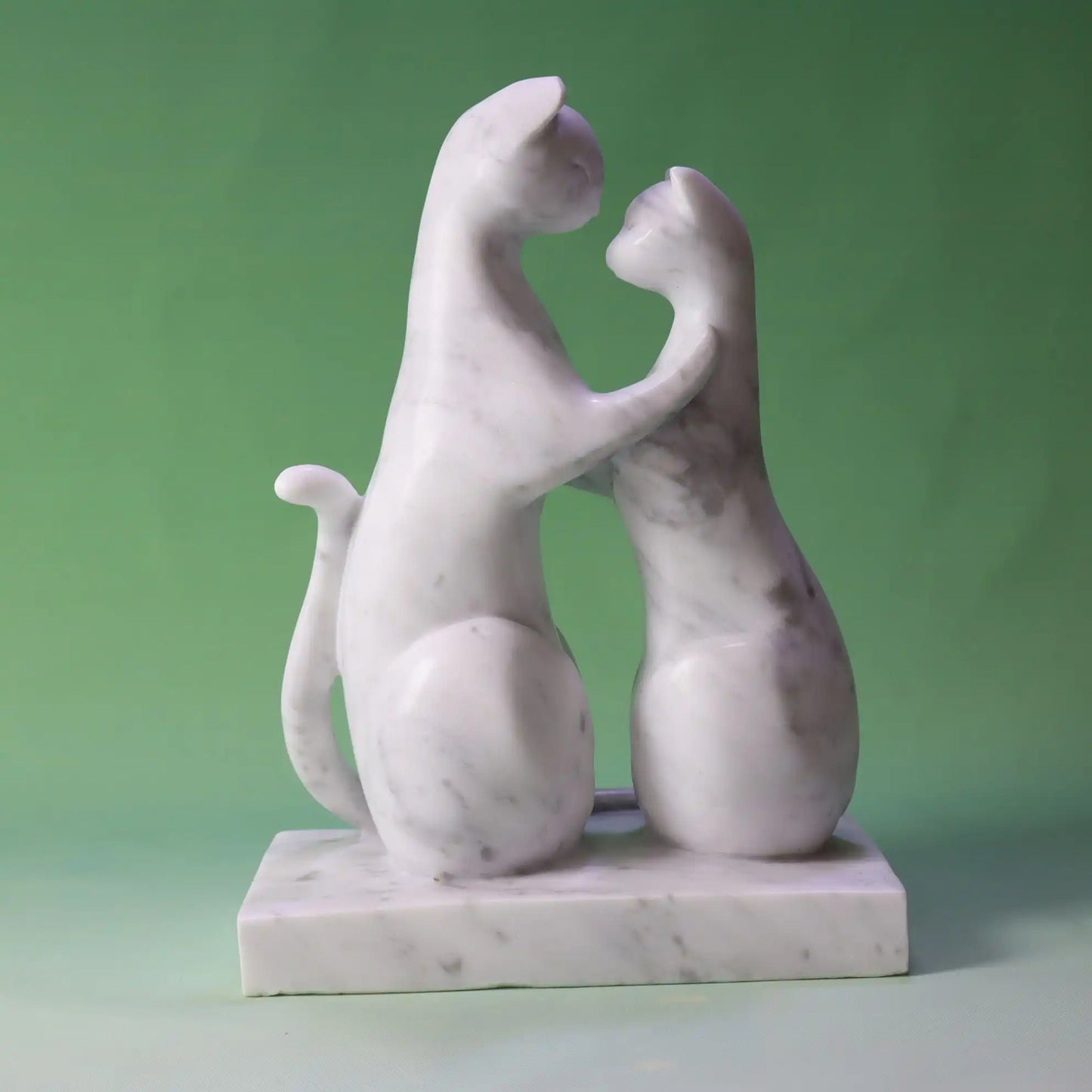 Elegant marble cat couple sculpture with a sleek modern design