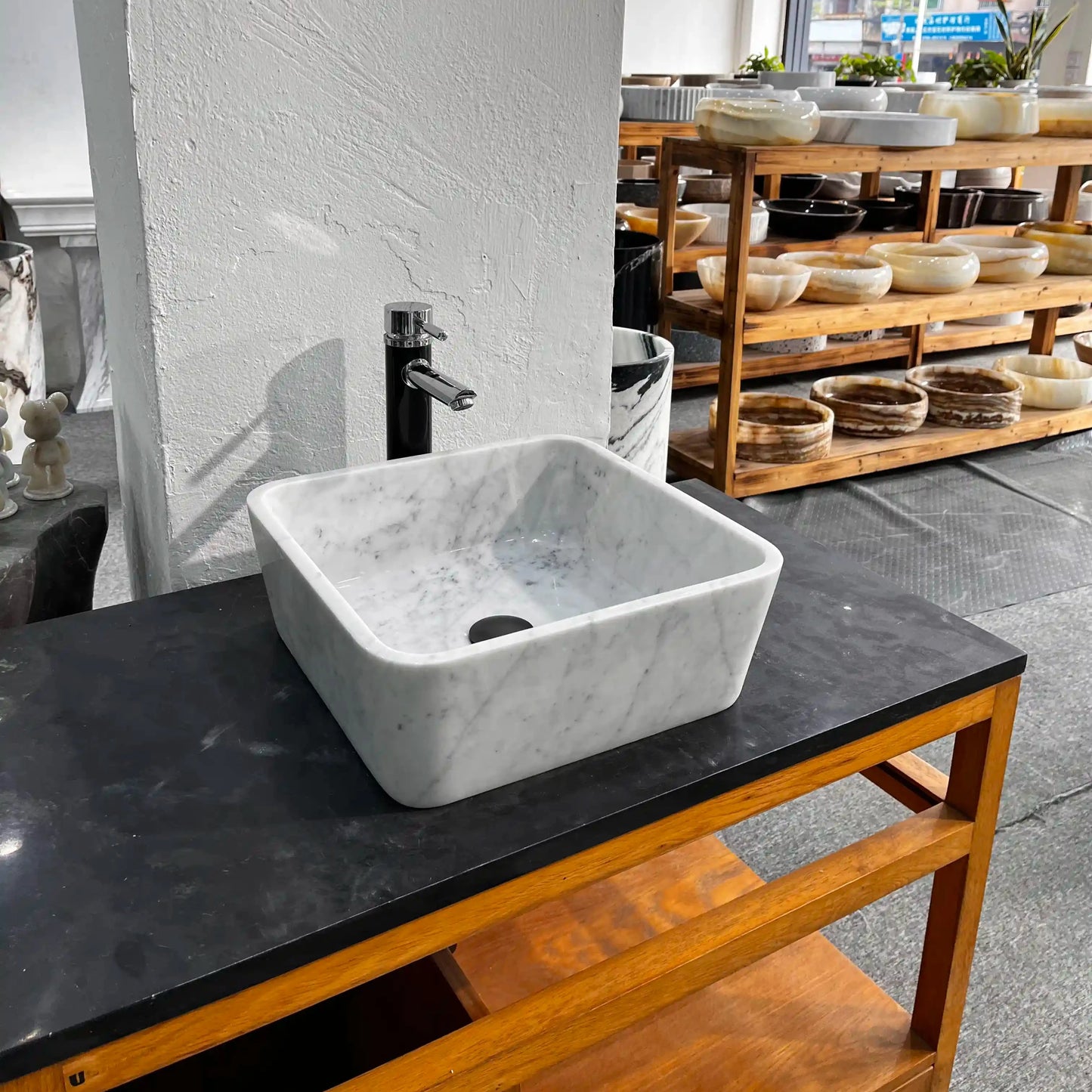 Rectangular marble sink with unique veining, available in custom options.