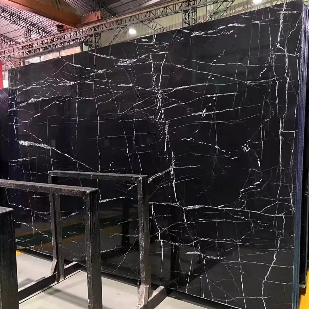 Black Marquina marble slab with striking white veining.